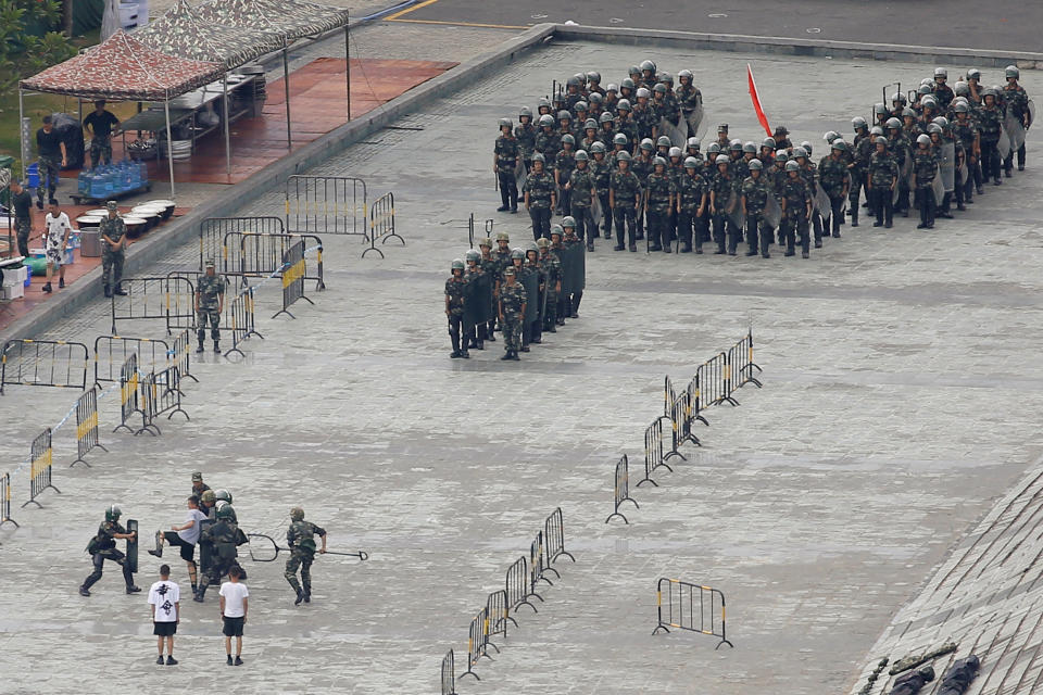 Chinese police have been practicing with terrifying fork devices amid protests in Hong Kong. (Reuters)