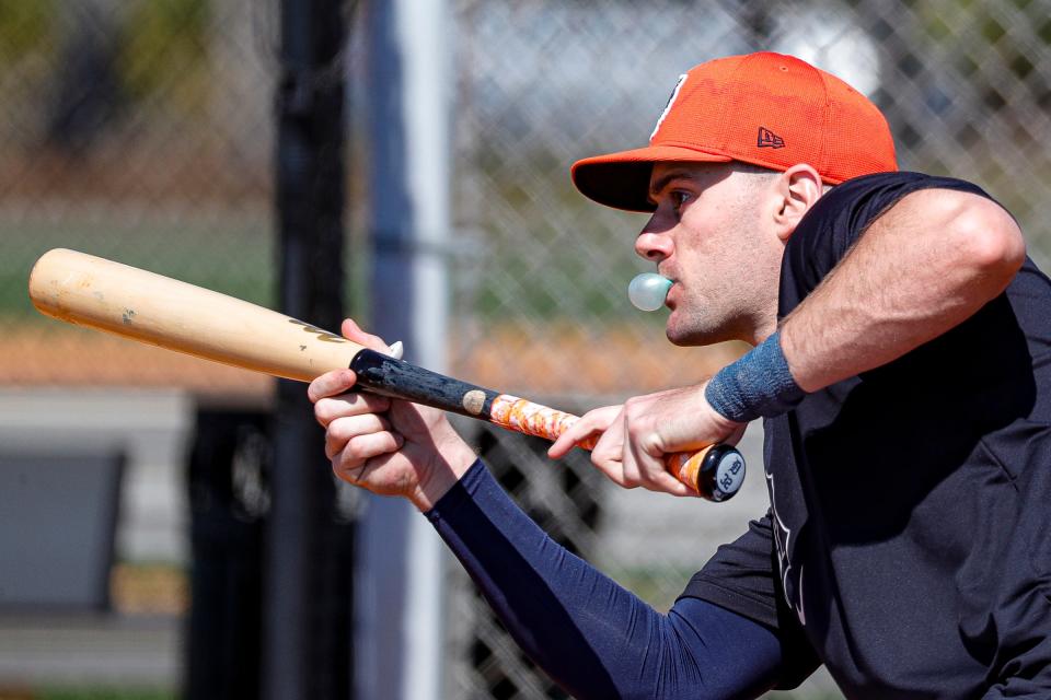 Detroit Tigers infielder Ryan Kreidler bunts during spring training at TigerTown in Lakeland, Fla. on Wednesday, Feb. 21, 2024.