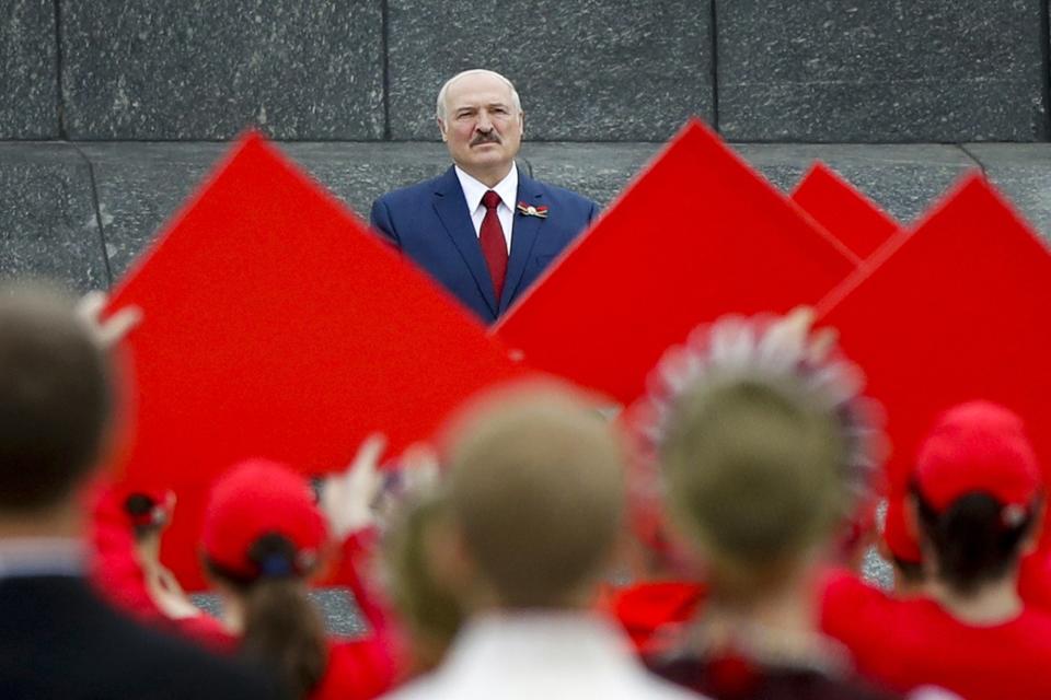 FILE - Belarusian President Alexander Lukashenko looks on during Independence Day celebrations, in Minsk, Belarus on Friday, July 3, 2020. For most of his 27 years as the authoritarian president of Belarus, Alexander Lukashenko has disdained democratic norms, making his country a pariah in the West and bringing him the sobriquet of “Europe’s last dictator." Now, his belligerence is directly affecting Europe. (AP Photo, File)