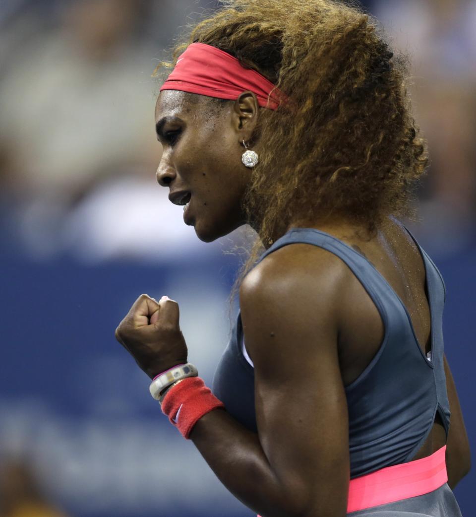 Serena Williams, of the United States, pumps her fist after winning a point against Francesca Schiavone, of Italy, during the first round of the 2013 U.S. Open tennis tournament, Monday, Aug. 26, 2013, in New York. (AP Photo/Charles Krupa)