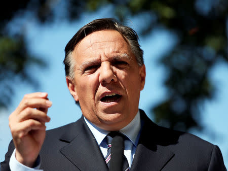 Coalition Avenir Quebec (CAQ) party leader Francois Legault speaks during a campaign stop in Saint-Bruno-de-Montarville, Quebec, August 29, 2012. REUTERS/Christinne Muschi/Files