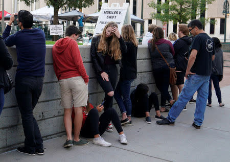 Taylor Swift fans wait outside Denver Federal Court to be let into the Swift groping trial in Denver U.S. August 9, 2017. REUTERS/Rick Wilking