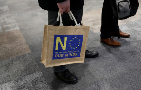 A delegate holds a bag during the UKIP party conference in Birmingham, Britain September 21, 2018. REUTERS/Darren Staples/Files