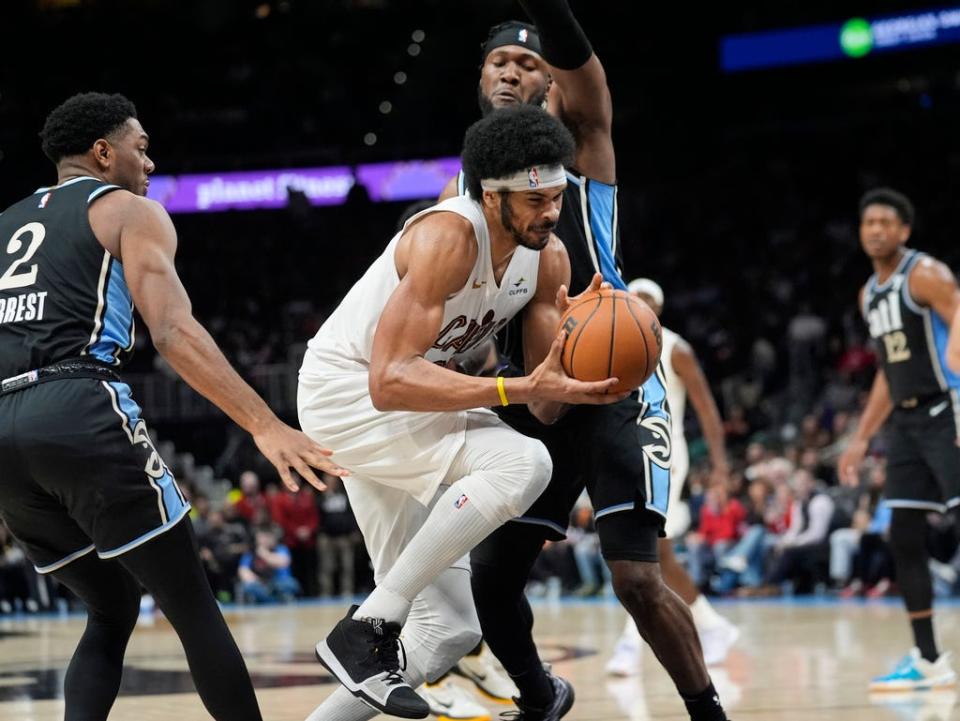 Cleveland Cavaliers center Jarrett Allen (31) drives against Atlanta Hawks forward Bruno Fernando (24) during the second half of an NBA basketball game Wednesday, March 6, 2024, in Atlanta. (AP Photo/John Bazemore)