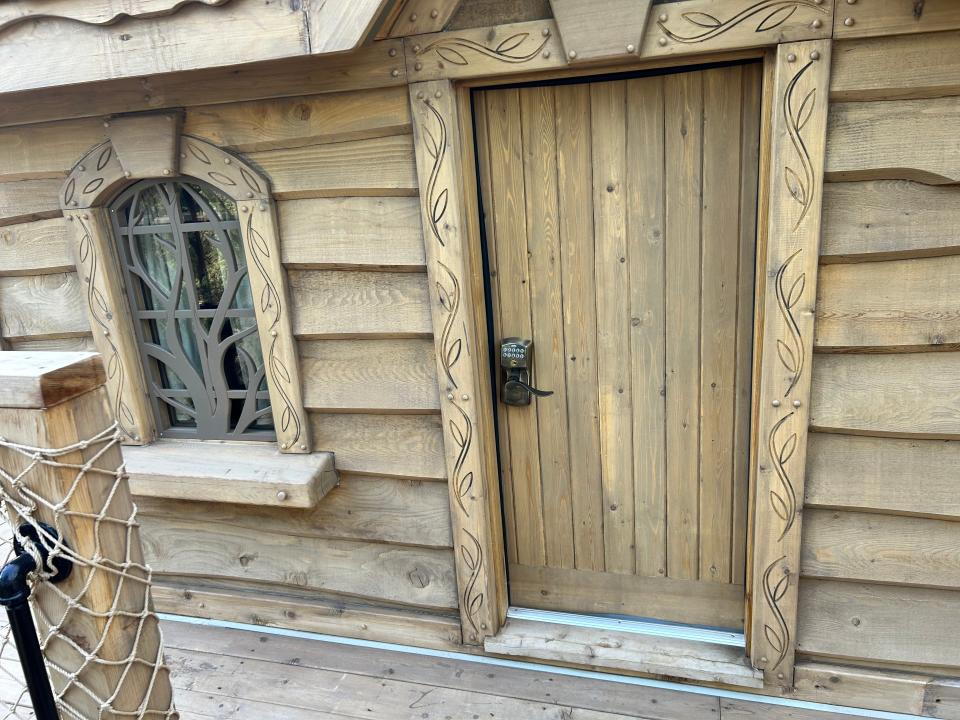 small door on balcony, wood