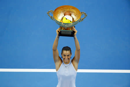 Tennis - China Open - Women's Singles Finals - Beijing, China - October 8, 2017 - Caroline Garcia of France holds the trophy after winning the match against Simona Halep of Romania. REUTERS/Thomas Peter