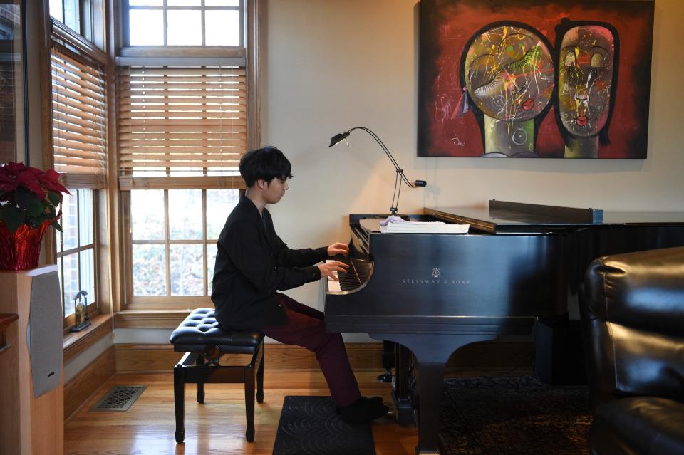 Haruki Takeuchi plays portions of Beethoven's Sonata No. 31, during a piano lesson with teacher David Northington, in Northington’s West Knoxville home, Thursday, Dec. 7, 2023.
