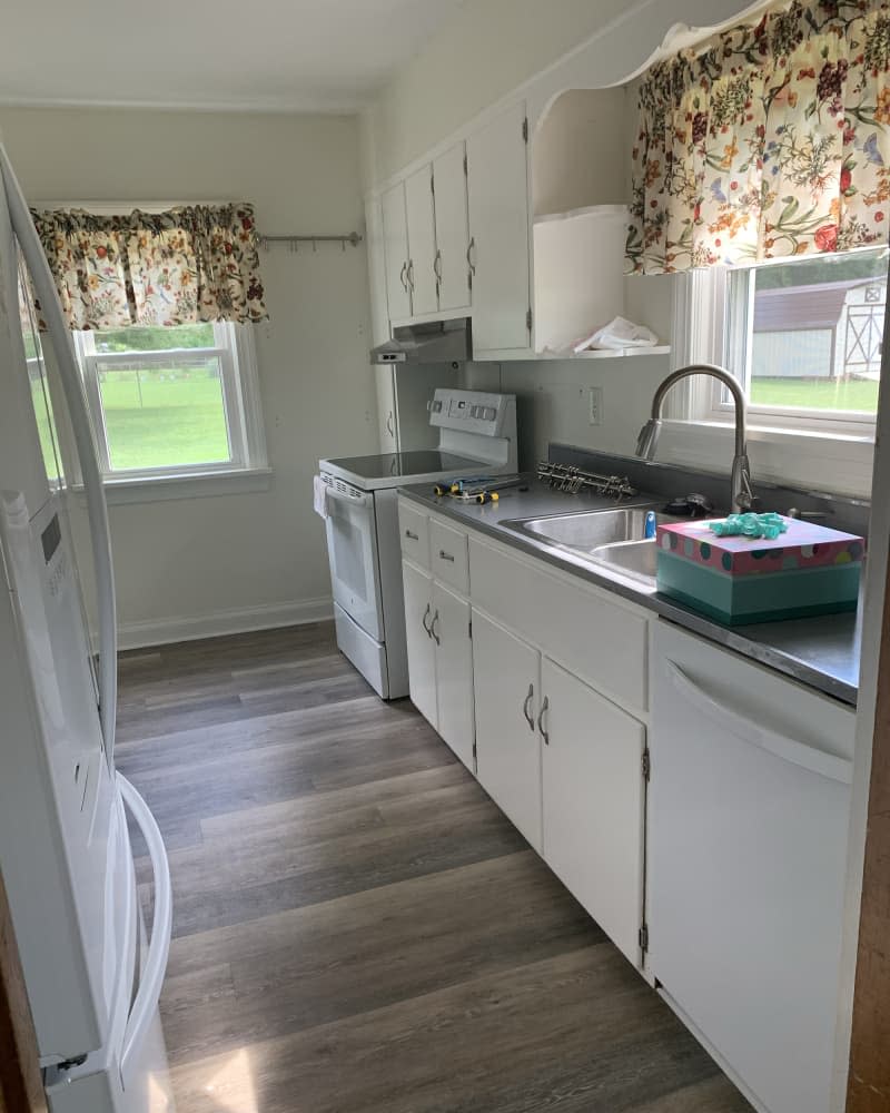 White outdated kitchen before renovation