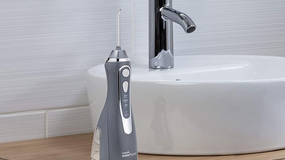 This Waterpik water flosser is revolutionizing home dental hygiene and Amazon has it for an eye-catching price cut.