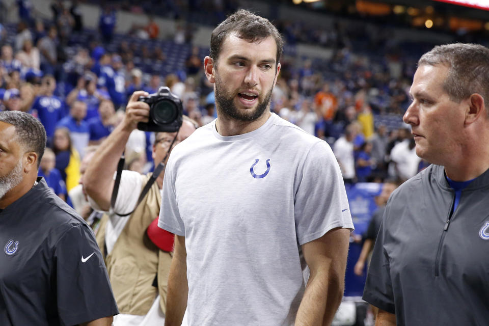 Andrew Luck walks off the field for the last time. (Getty)