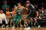 Nov 14, 2017; Brooklyn, NY, USA; Boston Celtics small forward Jayson Tatum (0) drives against Brooklyn Nets small forward Quincy Acy (13) during the fourth quarter at Barclays Center. Mandatory Credit: Brad Penner-USA TODAY Sports