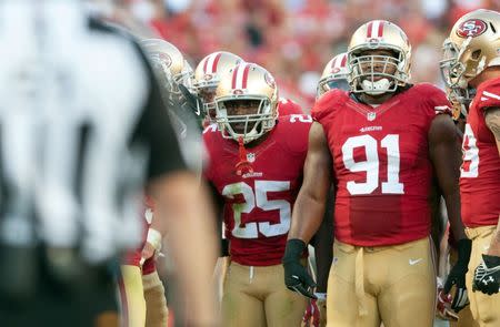 Sep 14, 2014; Santa Clara, CA, USA; San Francisco 49ers defensive end Ray McDonald (91) looks up to the scoreboard during a timeout in the game against the Chicago Bears at Levi's Stadium. The Chicago Bears defeated the San Francisco 49ers 28-20. Mandatory Credit: Ed Szczepanski-USA TODAY Sports