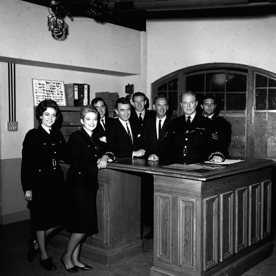 Nicholas Donnelly (fourth from the right) with the cast of Dixon of Dock Green (PA) (PA Archive)