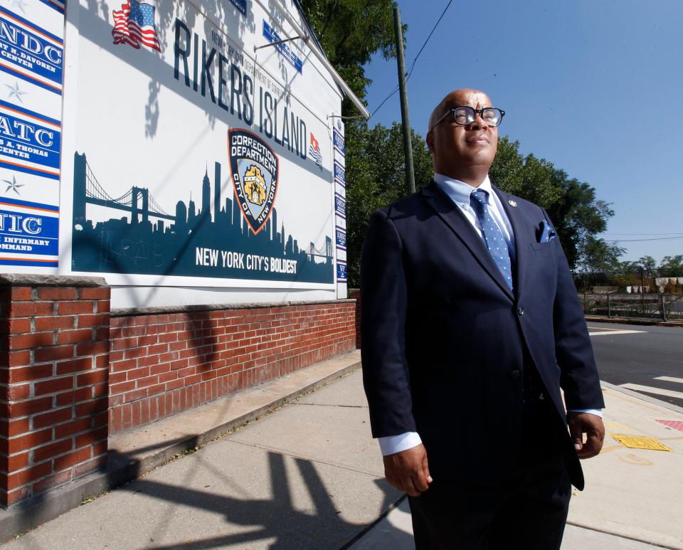 New York State Assemblyman Eddie Gibbs stands near the entrance to the Rivers Island jail complex in New York City Aug. 25, 2022. Gibbs, who spent about six yeas in prison in the 1980s and 1990s, including time at Rikers Island, spoke about the extreme heat that prisoners at old prison and jails such as Riders Island have to cope with. He also spoke about tactics that people in prison use to find respite from the heat.