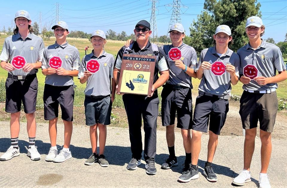 The Hesperia golf team poses for a photo at El Prado Golf Course after claiming the title at the CIF-Southern Section Division 7 Team Championship tournament.