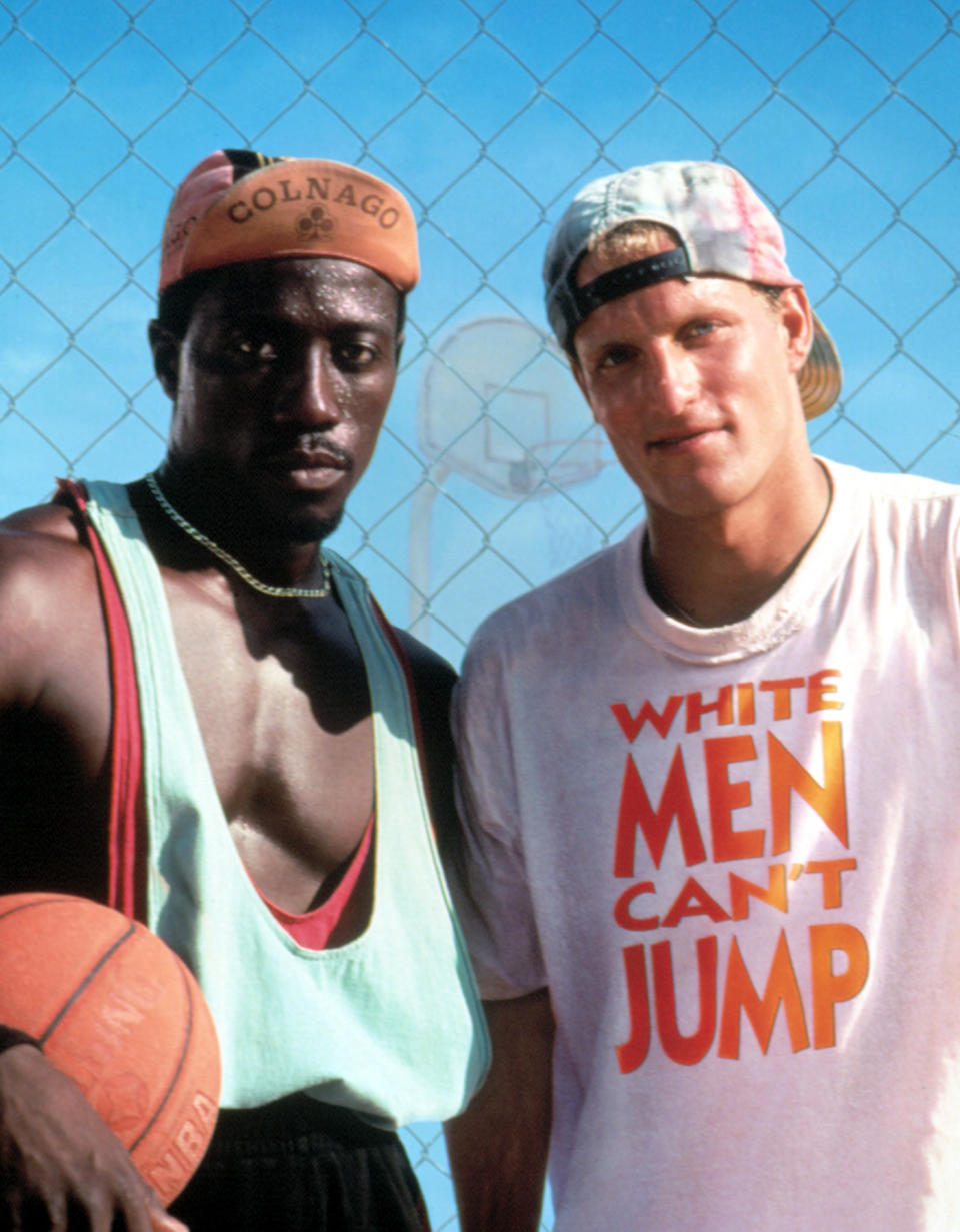 Wesley Snipes as Sidney and Woody Harrelson as Billy pose in a promotional photo for "White Men Can't Jump"