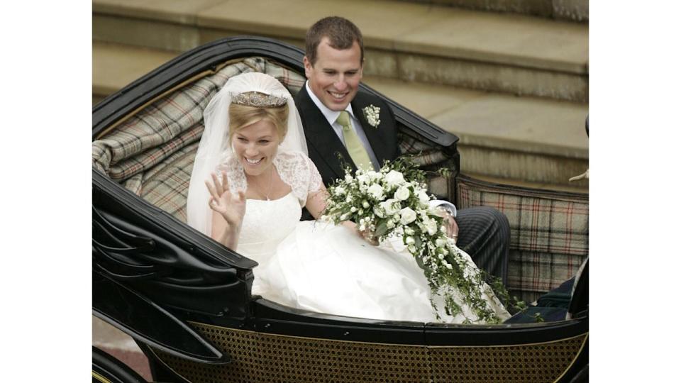 Peter Phillips and Autumn Phillips in a wedding carriage