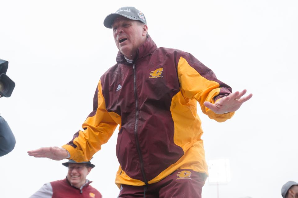 Central Michigan head football coach Jim McElwain celebrates his win against  Washington State at the 88th Tony the Tiger Sun Bowl at Sun Bowl Stadium in El Paso, Texas, on Friday, Dec. 31, 2021.