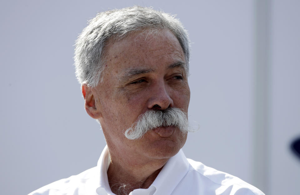 FILE - In this Saturday, Sept. 7, 2019 file photo, CEO of the Formula One Group, Chase Carey arrives prior to the third free practice at the Monza racetrack, in Monza, Italy. Formula One races won't be canceled if a driver tests positive for the coronavirus or if a team withdraws, CEO Chase Carey says. F1 is keen to avoid a repeat of the season opener in Australia in March, which was canceled when McLaren withdrew after a staff member tested positive for the virus. The season is now set to start with two races in Austria on July 5 and 12. (AP Photo/Luca Bruno, File)