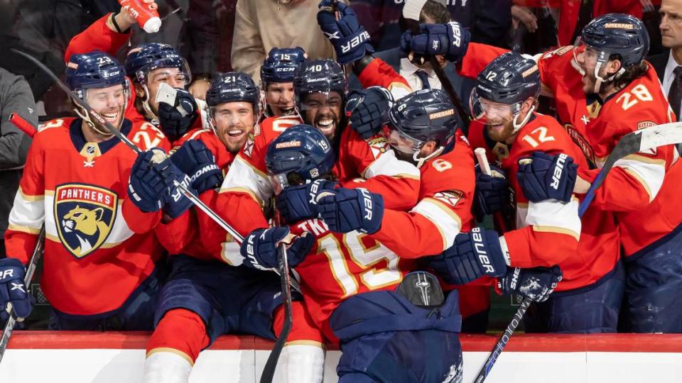 Florida Panthers left wing Matthew Tkachuk (19) celebrates with his teammates after scoring a goal against the Carolina Hurricanes in the third period of Game 4 of the NHL Stanley Cup Eastern Conference finals series at the FLA Live Arena on Wednesday, May 24, 2023 in Sunrise, Fla.