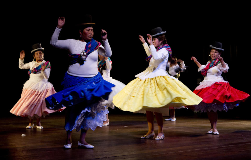 In this April 30, 2019, miembros de la compañía de teatro "Kory Warmis" o Mujeres de oro actúan en el Teatro Municipal, en La Paz, Bolivia. (AP Foto/Juan Karita)