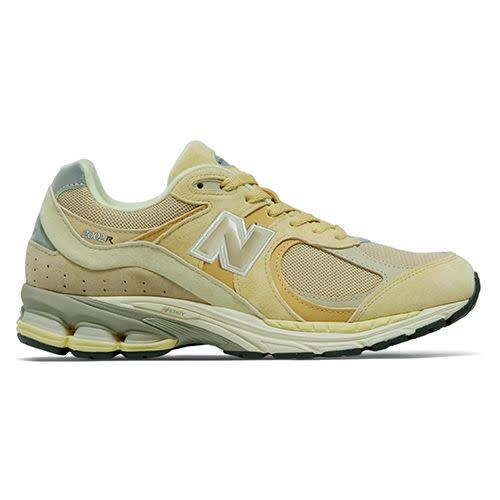 <p><a class="link " href="https://www.laced.co.uk/products/new-balance-2002r-x-auralee-beige?size=9&gclid=Cj0KCQjwmouZBhDSARIsALYcouq84UkF4mq9xh4i_Pvd_6TQ33JMzcg_s1lFsWrBGELiAmrk0LV2GlwaAl2cEALw_wcB" rel="nofollow noopener" target="_blank" data-ylk="slk:SHOP;elm:context_link;itc:0;sec:content-canvas">SHOP</a></p><p>The 2002R has a healthy new glow by dint of New Balance’s collaboration with seven-year-old Tokyo-based label Auralee. </p><p>£290; <a href="https://www.laced.co.uk/products/new-balance-2002r-x-auralee-beige?size=9&gclid=Cj0KCQjwmouZBhDSARIsALYcouq84UkF4mq9xh4i_Pvd_6TQ33JMzcg_s1lFsWrBGELiAmrk0LV2GlwaAl2cEALw_wcB" rel="nofollow noopener" target="_blank" data-ylk="slk:laced.co.uk;elm:context_link;itc:0;sec:content-canvas" class="link ">laced.co.uk</a></p>