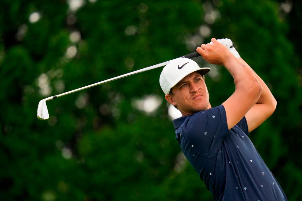 Cameron Champ watches his shot on the ninth hole during the first round of the Travelers Championship golf tournament at TPC River Highlands, Thursday, June 23, 2022, in Cromwell, Conn. (AP Photo/Seth Wenig)