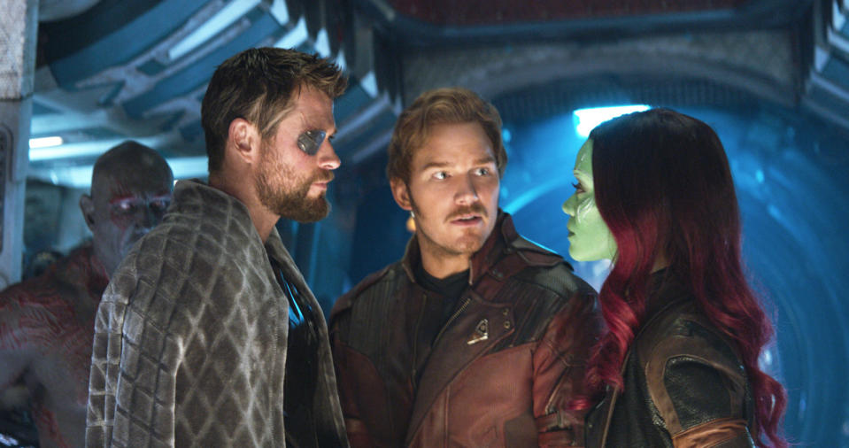 Marvel Studios’ AVENGERS: INFINITY WAR..L to R: Thor (Chris Hemsworth), Star-Lord/Peter Quill (Chris Pratt) and Gamora (Zoe Saldana), b/g Drax (Dave Bautista)