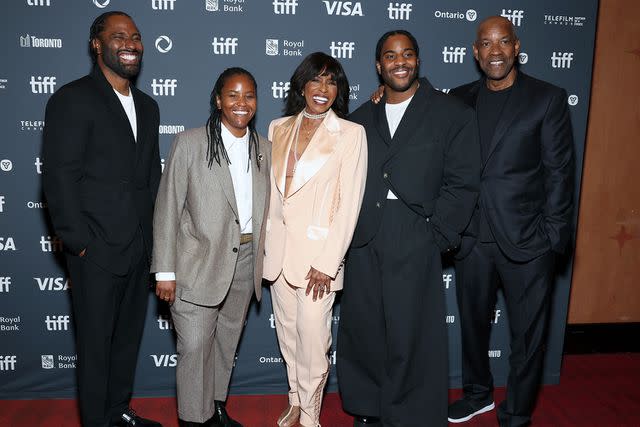 <p>Monica Schipper/Getty</p> John David Washington, Katia Washington, Pauletta Washington, Malcolm Washington and Denzel Washington on Sept. 10, 2024