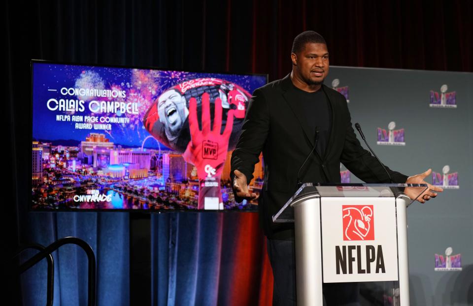 Feb 7, 2024; Las Vegas, NV, USA; Calais Campbell receives the NFLPA Alan Page Community Award at the NFLPA Press Conference at the Mandalay Bay Convention Center prior to Super Bowl LVIII. Mandatory Credit: Kyle Terada-USA TODAY Sports