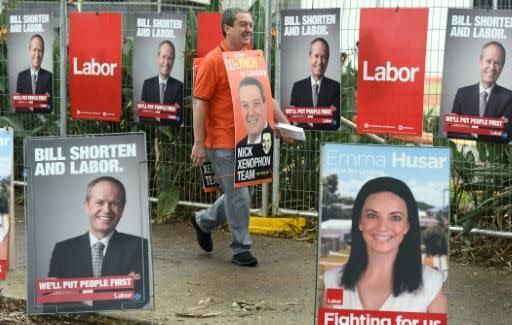 Campaigners prepare from election day. Photo: AFP