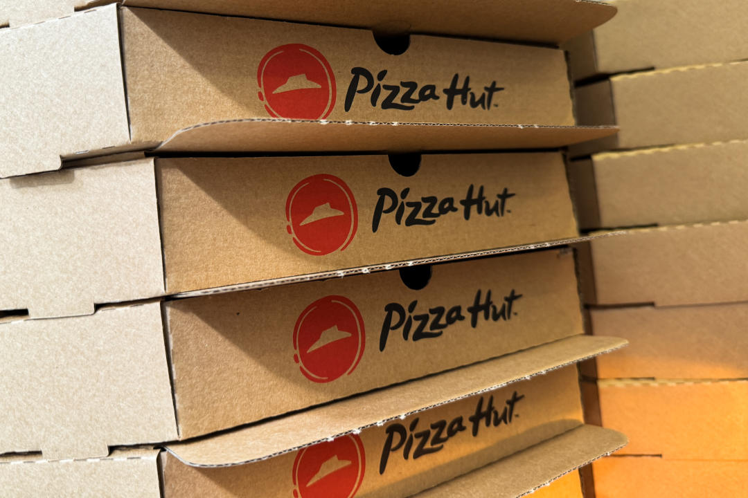Pizza Hut logos are seen on boxes in Krakow, Poland on April 20, 2024. (Photo by Jakub Porzycki/NurPhoto via Getty Images)