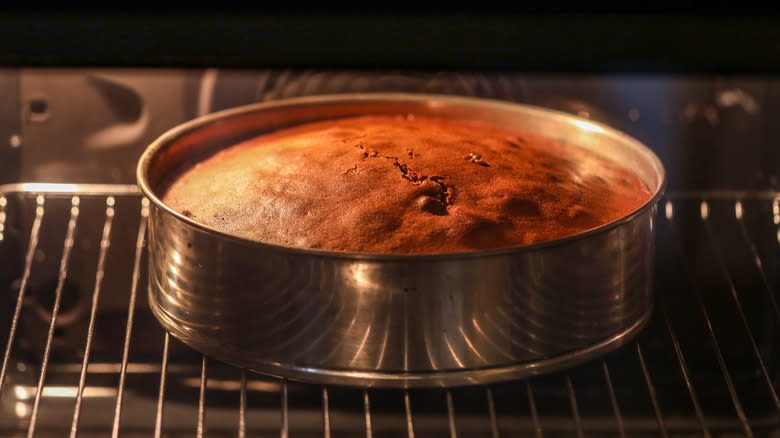 cake baking on oven rack