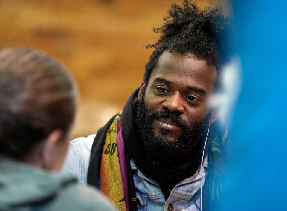 Gary Gore is surveyed on Wednesday at Broad Street United Methodist Church, where a warming center is located, as the Community Shelter Board conducted its annual count of homeless people.