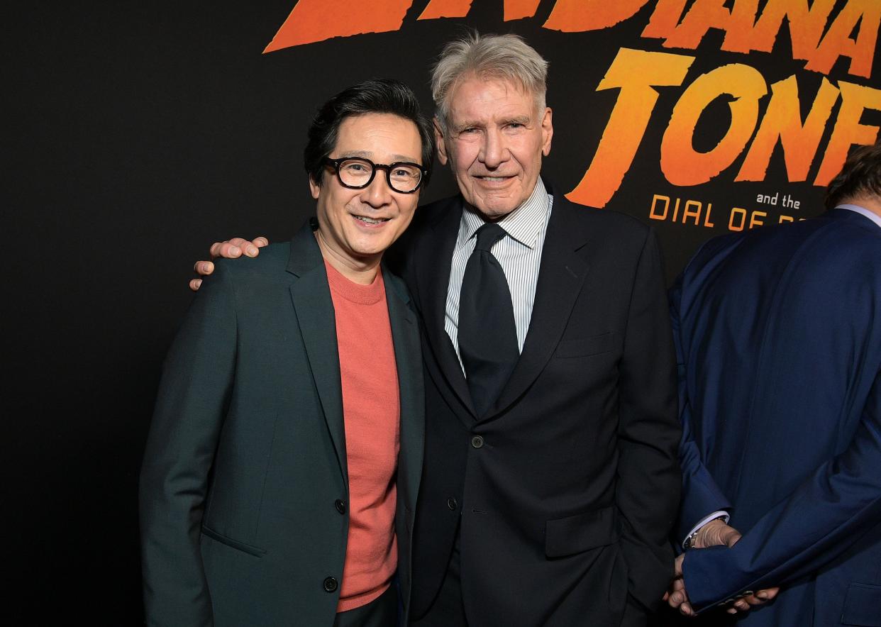 LOS ANGELES, CALIFORNIA - JUNE 14: (L-R) Ke Huy Quan and Harrison Ford attend the Indiana Jones and the Dial of Destiny U.S. Premiere at the Dolby Theatre in Hollywood, California on June 14, 2023. (Photo by Charley Gallay/Getty Images for Disney)