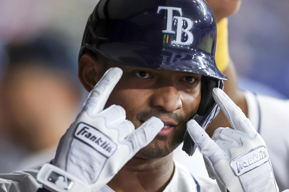 Tampa Bay Rays' Christian Bethancourt celebrates in the dugout after hitting a home run against the Boston Red Sox during the sixth inning of a baseball game Tuesday, Sept. 6, 2022, in St. Petersburg, Fla. (AP Photo/Mike Carlson)