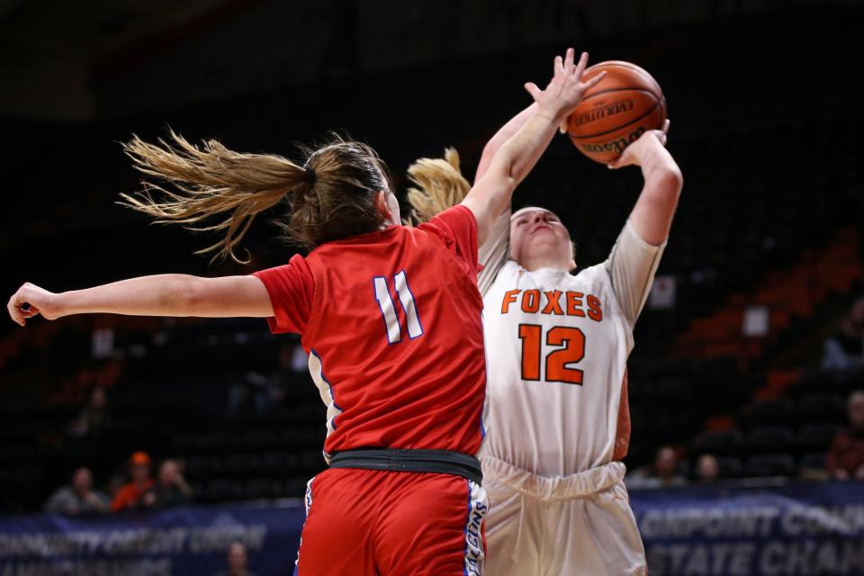 Silverton’s Kyleigh Brown is fouled by La Salle’s Emma Buchanan as the Silverton Foxes take on La Salle Prep in the OSAA 5A girls state tournament quarterfinals at Gill Coliseum on Tuesday, March 7, 2023.