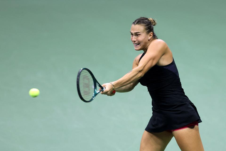 Belarus's Aryna Sabalenka plays a backhand return against USA's Emma Navarro (AFP via Getty Images)