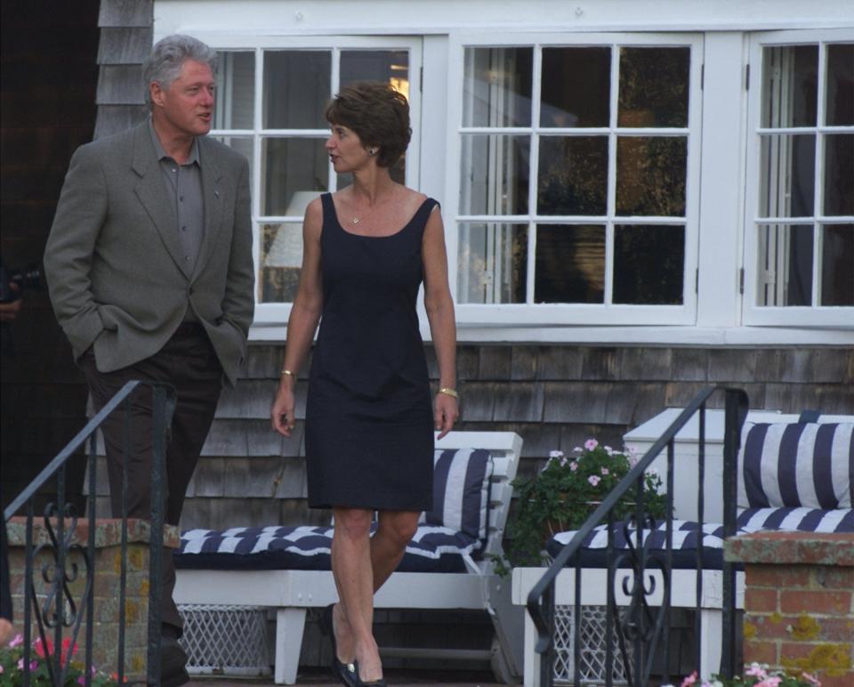 In a 2000 photo, President Bill Clinton and Kathleen Kennedy Townsend, lieutenant governor  of Maryland, leave the Hyannisport home of President Kennedy after a tour during Clinton's visit to the Kennedy compound.