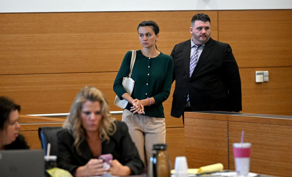 Ashley Benefield returns to the courtroom after a brief break in the voir dire portion of her trial for the second-degree murder of her estranged husband in 2020 at the Manatee County Judicial Center, July 22, 2024.