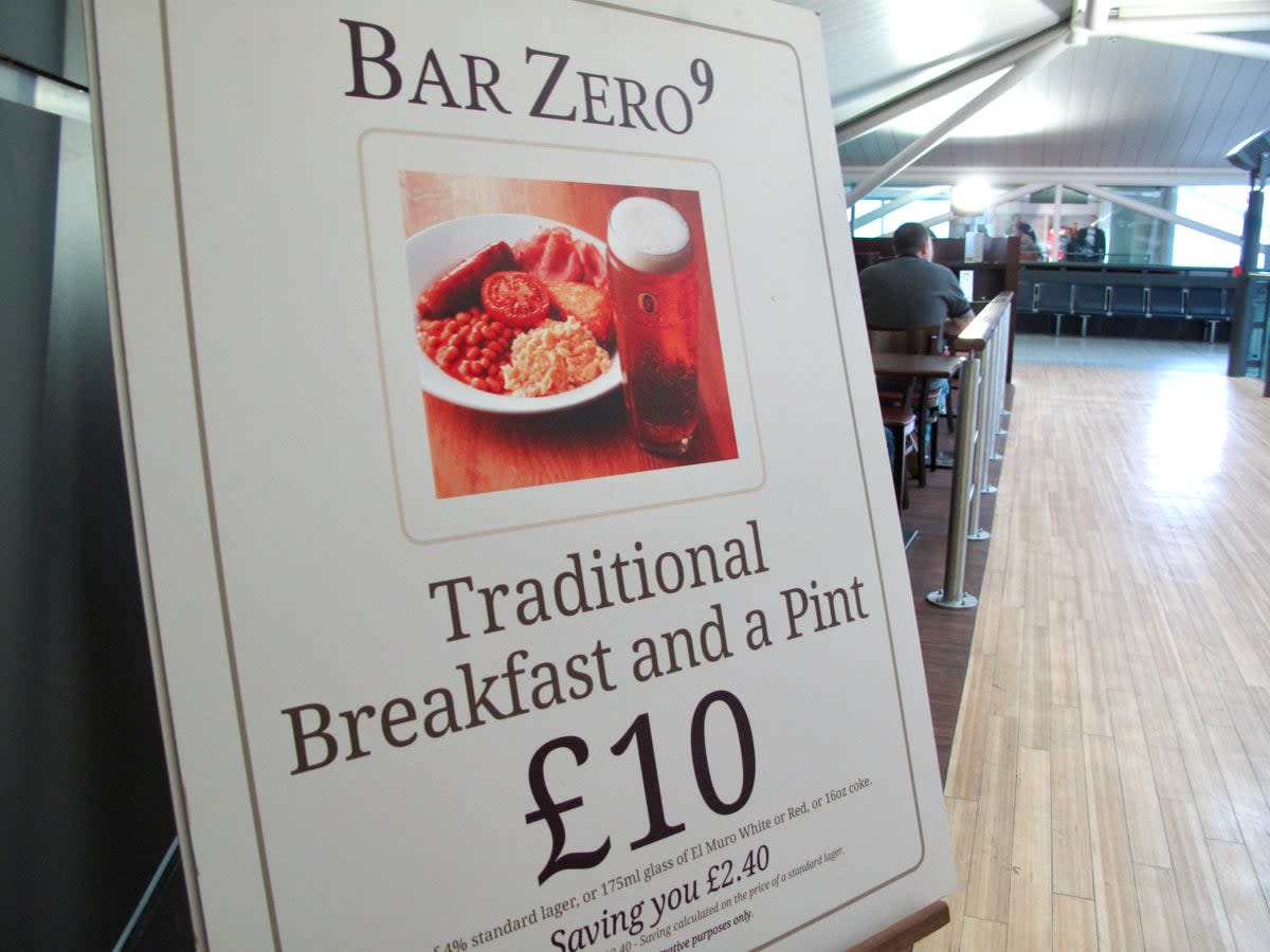 Good start? Poster at Bristol airport offering breakfast and a pint (file photo) (Simon Calder)