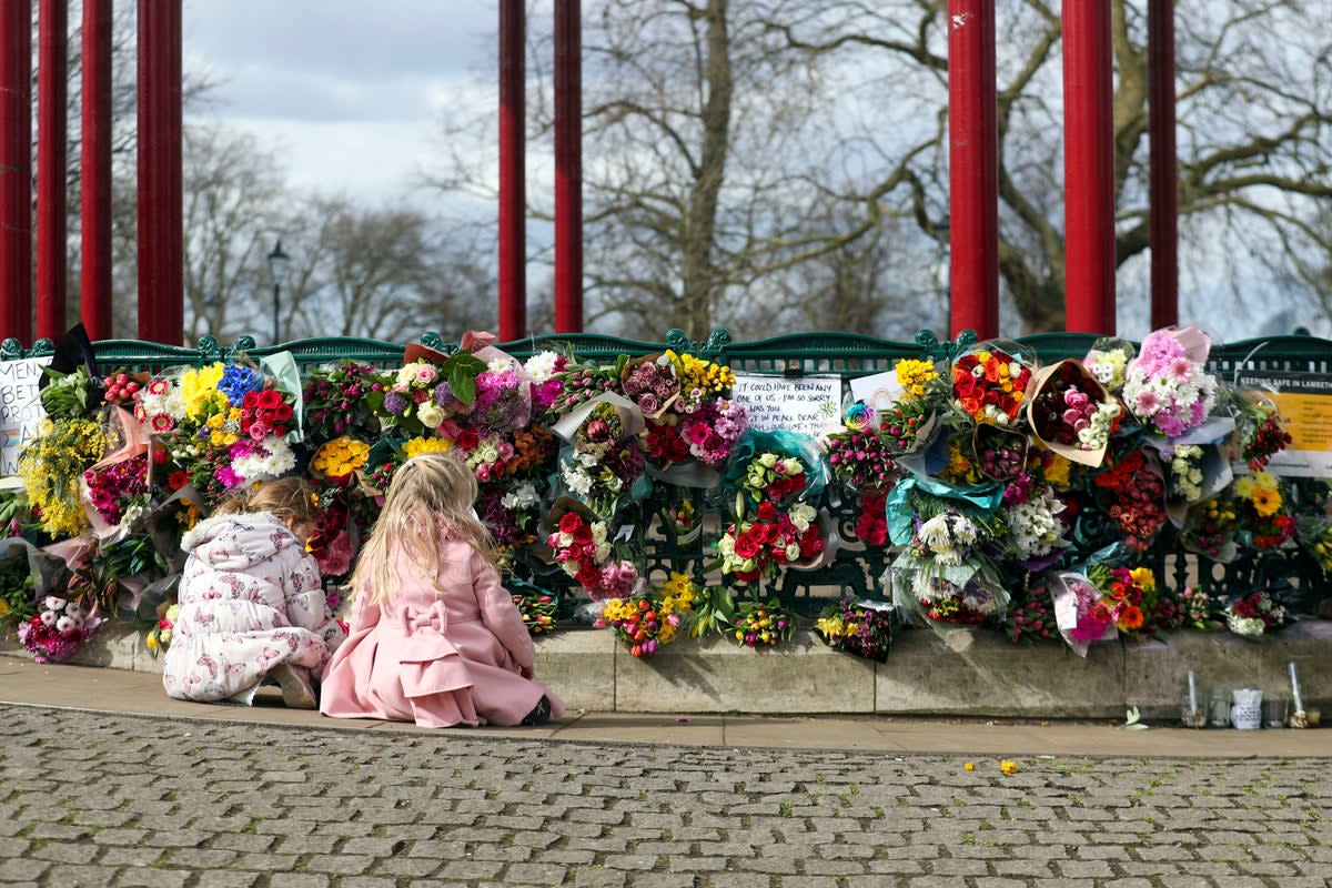 Tributes paid to Sarah Everard at Clapham Common vigil: People leave floral tributes (PA)