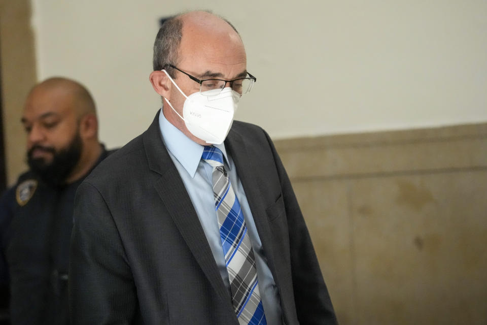 Donald Bender leaves the courtroom during a lunch break in a civil business fraud trial against former President Donald Trump, Wednesday, Oct. 4, 2023, in New York. Bender is an accountant testifying in the case. (AP Photo/Mary Altaffer)