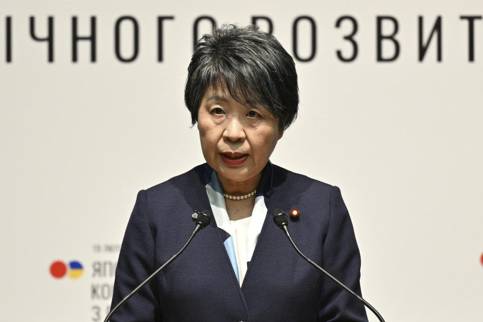Japan's Foreign Minister Yoko Kamikawa delivers a speech during the Japan-Ukraine Conference for Promotion of Economic Growth and Reconstruction at Keidanren Kaikan building in Tokyo, Monday, Feb. 19, 2024. (Kazuhiro Nogi/Pool Photo via AP)
