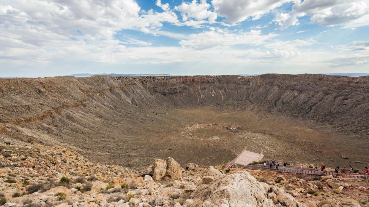 wide angle showing meteor crater impact spot in arizona desert