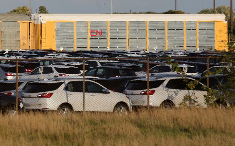 FILE PHOTO: Chevrolet Equinox SUVs are parked awaiting shipment near the General Motors Co (GM) CAMI assembly plant in Ingersoll