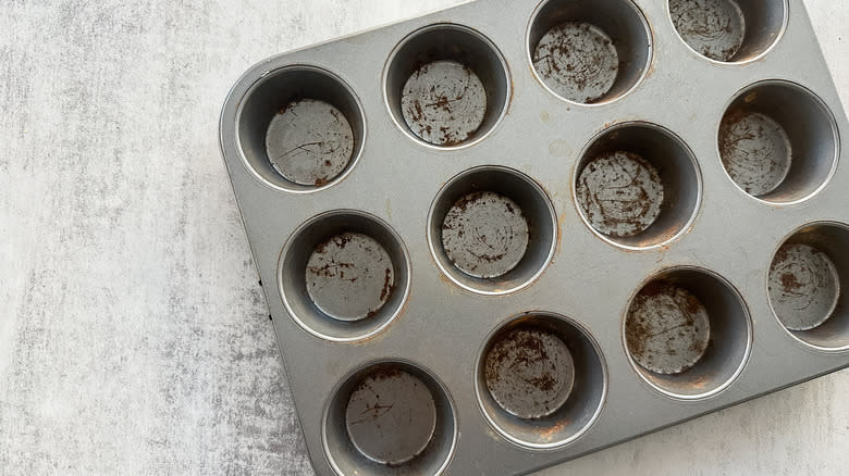 muffin tin sprayed with nonstick cooking spray