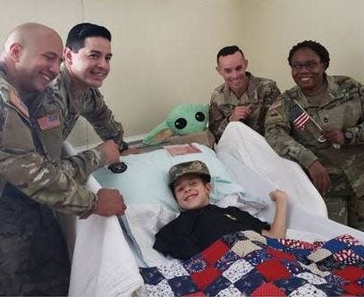 Nine-year-old Dominik “joined” the Army for his final wish. The soldiers honored him with gifts, and Hospice of Marion County conducted an official veterans recognition ceremony.