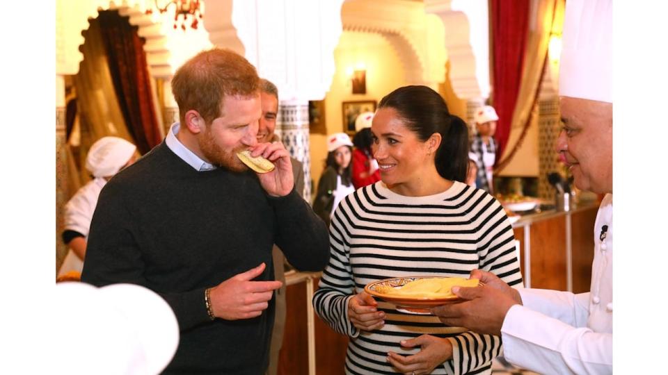 Prince Harry and Meghan eating