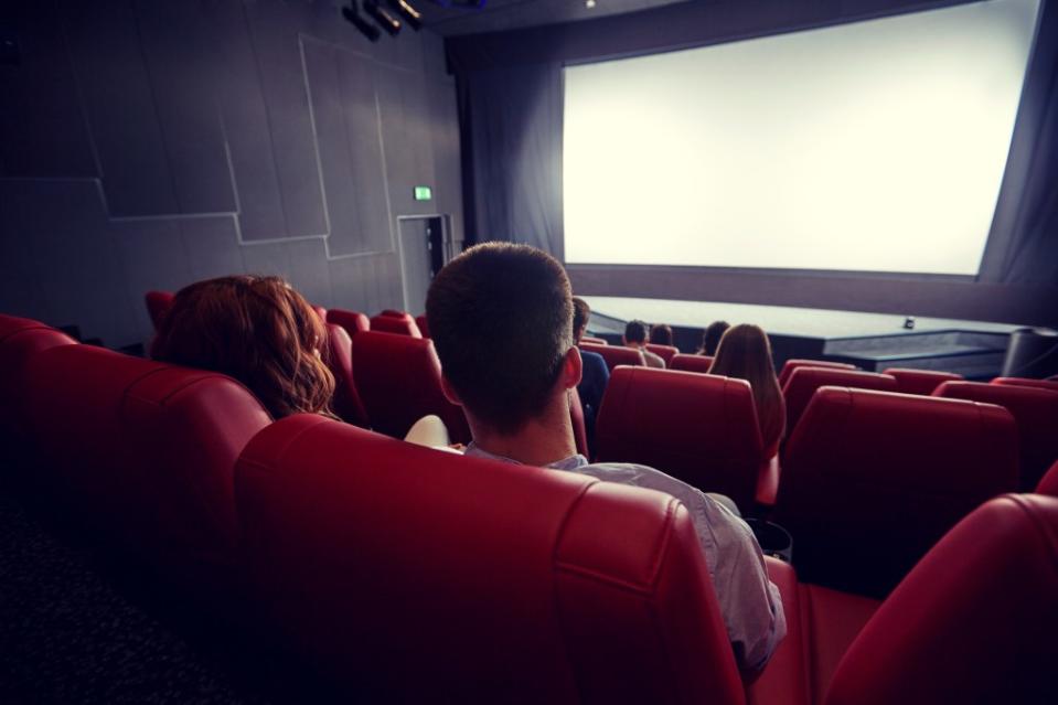 Previously, theaters could only sell the drinks if they had a restaurant license with a full kitchen and waitstaff to bring the alcohol to customers in their seats — or a tavern license that limited drinking to a table, often in the lobby. Syda Productions – stock.adobe.com